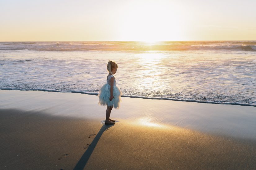 little girl by the ocean